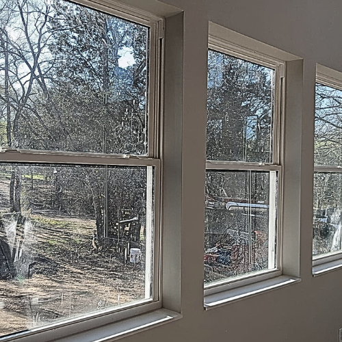 Dirty window at Daylight window and chimney cleaning in fort smith arkansas